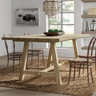 dulce extendable solid wood bohemian dining table mistana